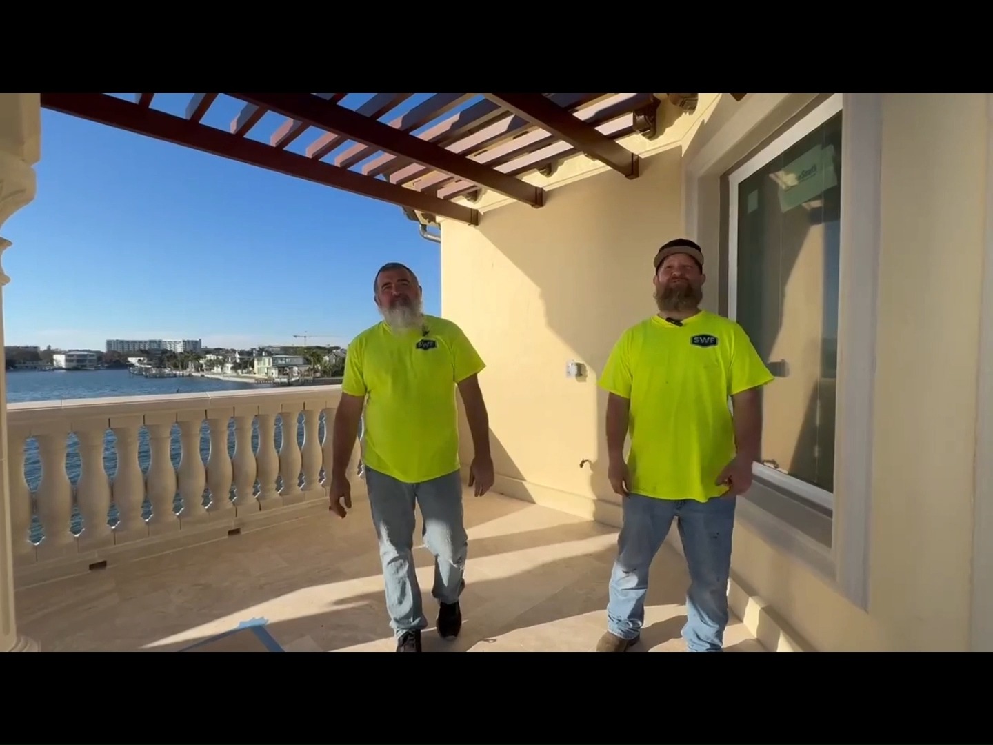 Ernesto and a shop hand wearing Superior Welding & Fabrication shirts